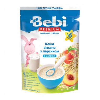 Дитяча каша Bebi Premium молочна вівсяна з персиком +6 міс. 200 г (8606019654306) фото №1