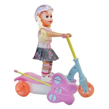 Лялька Na-Na ID1 на скутері (T2-001) фото №1