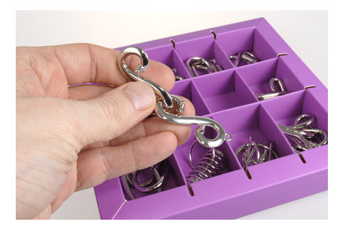 Набір головоломок 10 Metal Puzzles violet 10 головоломок Eureka! 3D Puzzle 473359 фото №1